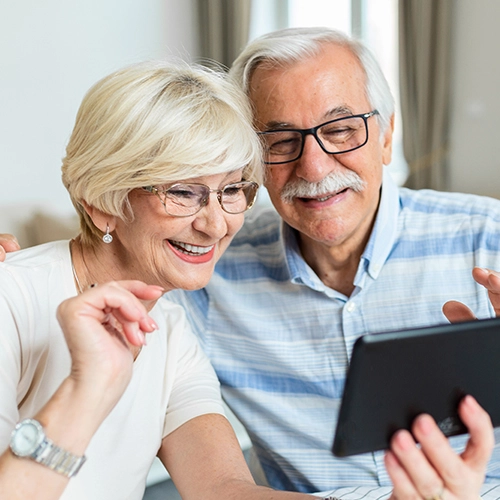 Senior couple viewing tablet