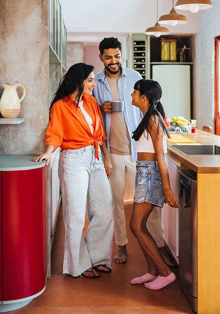 Family talking in kitchen during planning