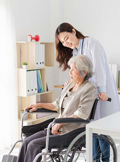 Caregiver helping older adult